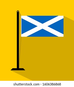 scotland flag on pole, isolated on yellow background