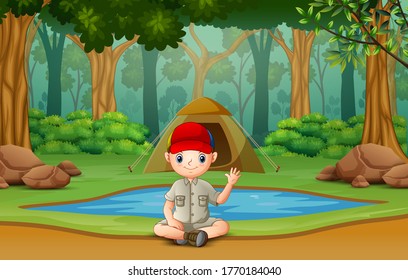Scout boy camping out in the wood