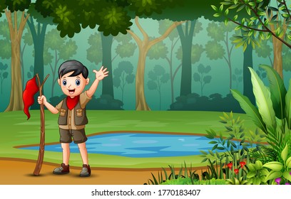 Scout boy hiking in the wood
