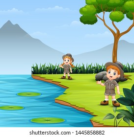 Scout kids talking and exploring in nature landscape