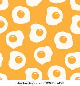 Scrambled eggs repeating print. Vector hand drawn seamless pattern. Eggs on yellow background.