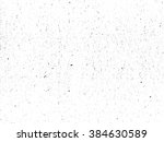 Scratched paper or distressed cardboard texture. Black and white colored grunge vector background