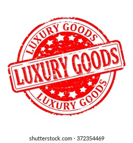 Scratched round red stamp with the word - luxury goods - vector