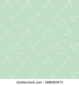 Scratches in white on a light turquoise surface. Simple crushed geometric pattern. Wallpaper texture.
