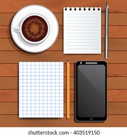 Scratchpad sheets, pencil and pen, cappuccino, smartphone, top view