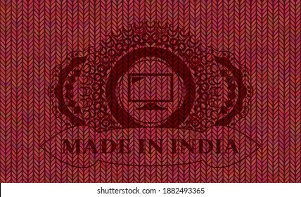screen icon and Made in India text Red color woolen fabric realistic badge. Cloth chic background. Vector illustration. 