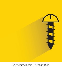 screw nail with shadow on yellow background