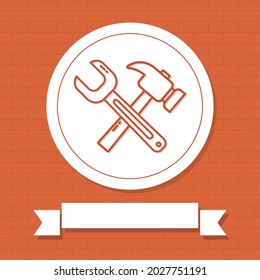 screwdriver and hammer illustration with decorative ribbon