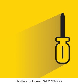 icono de destornillador con sombra sobre fondo amarillo
