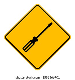 Screwdriver and road sign on white