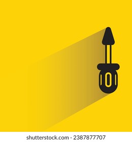 screwdriver with shadow on yellow background