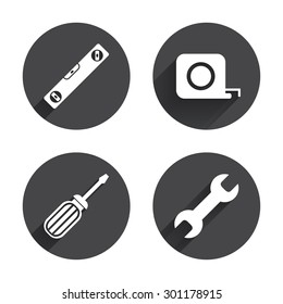 Screwdriver and wrench key tool icons. Bubble level and tape measure roulette sign symbols. Circles buttons with long flat shadow. Vector