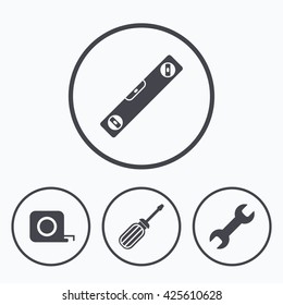 Screwdriver and wrench key tool icons. Bubble level and tape measure roulette sign symbols. Icons in circles.
