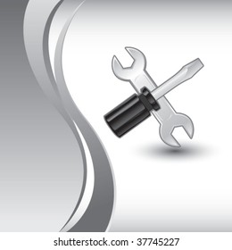 destornillador y llave en el fondo de la onda de plata vertical