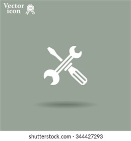Screwdriver and Wrench. Tools vector icon.