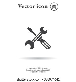 Screwdriver and Wrench. Tools vector icon.