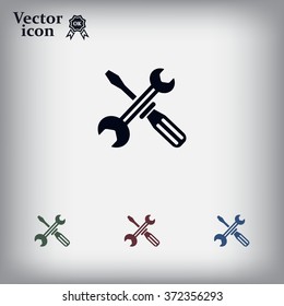 Screwdriver and Wrench. Tools vector icon.
