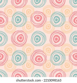Scribble circles texture. Green, red, orange and pink colors. Regular abstract seamless pattern. Hand drawn elements background for wrapping, fabric, wallpaper or cards.