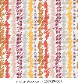 Scribbled or doodled vertical stripes in warm halftone dot colors on cream. Seamless repeat vector pattern swatch for background or surface design.