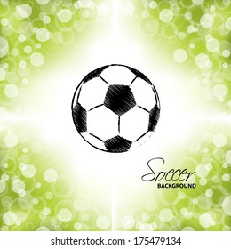 Scribbled soccer ball on abstract dotted green and white background
