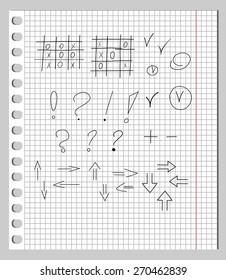 Scribbles in notebook into a cell - tic-tac-toe, punctuation marks, arrows, checkmark. 