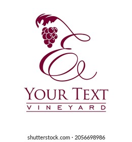 Script capital letter E decorated with grapes and vines 