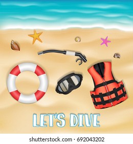scuba diving mask safety vest safety torus on beach
