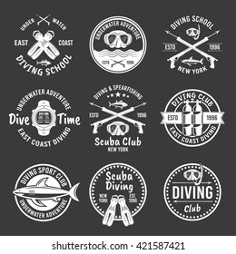 Scuba diving and spearfishing, diver school or club set of vector white labels, badges, emblems isolated on dark background