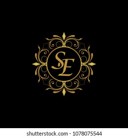 SE Initial logo. Ornament ampersand monogram golden logo black background