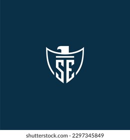 SE initial monogram logo for shield with eagle image vector design