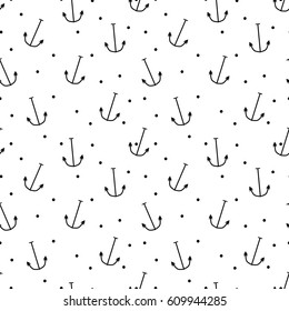 Sea anchors and dots on a white background. Seamless vector illustration. The marine theme.  