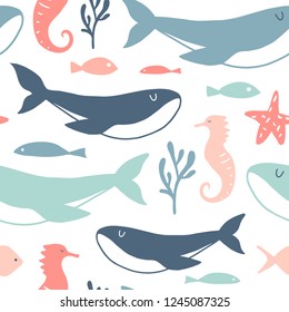 Sea animals seamless pattern. Vector cartoon underwater creatures texture: starfish, sea horse, shell, fish, whale. Ocean background with marine symbols for textile, paper, wrapping paper