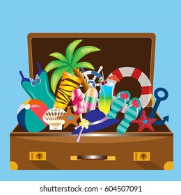 sea background: suitcase with beach accessories