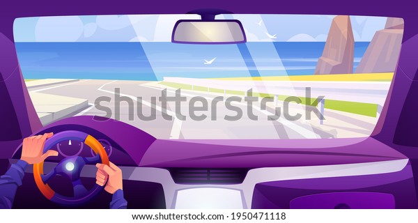Sea beach view from car interior through\
windshield. Vehicle salon inside with hands on steering wheel and\
dashboard. Vector cartoon landscape of highway, ocean shore,\
mountains and seagulls