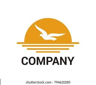 sea bird fly animal wildlife fauna wing in sky freedom bird feather logo idea design illustration concept in afternoon with orange sun flight over ocean up on sea