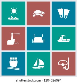 Sea icon. collection of 9 sea filled icons such as flippers, cargo ship, land territory, snorkel, turtle, man laying in sun, sailboat. editable sea icons for web and mobile.