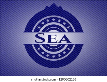 Sea jean or denim emblem or badge background