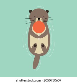 sea otter with orange candy on water