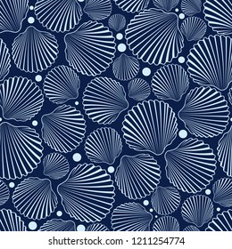 Sea seamless pattern with blue shells.Summer vector background.Textile texture