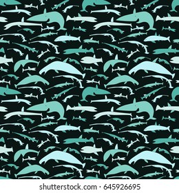 Sea seamless pattern. Hand drawn fish. Nautical backgrounds in blue colors, on a dark background. Vector illustration