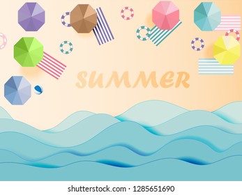 Sea view in summer with water play equipment placed on the beach. view of the blue sea. summer time. sea with beach. paper cut and craft style. vector, illustration.