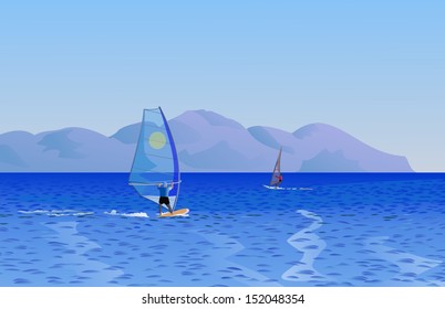 Vista al mar con dos windsurfistas