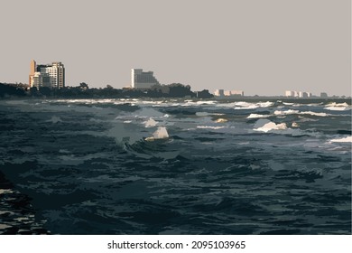 sea waves on the beach with buildings at the back