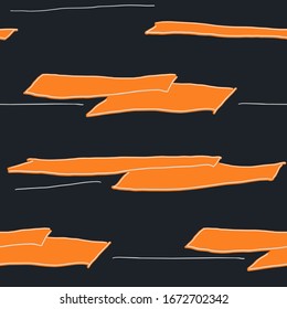 Seaess pattern with smudgws of white and orange lights on dark background.