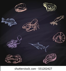 Seafood concept on chalkboard. Template with fish silhouettes fo