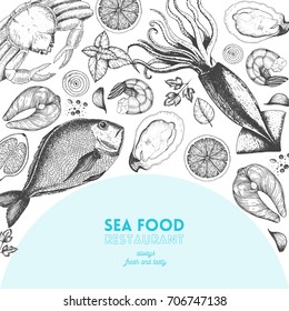 Seafood design template. Vector illustration with fish, squid, acrab, shrimp, oysters and lemons. Engraved style image with sea food.