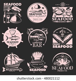 Seafood emblem set on dark with headlines fresh seafood fresh fish highest quality vector illustration