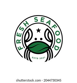 seafood restaurant logo, crab and abstract leaf in a circle