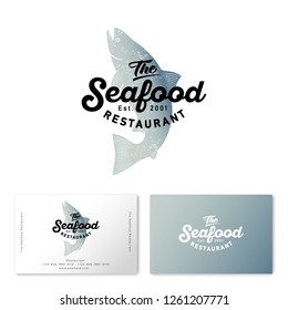 Seafood restaurant logo. Watercolor Salmon silhouette isolated on a light background. The vintage style.