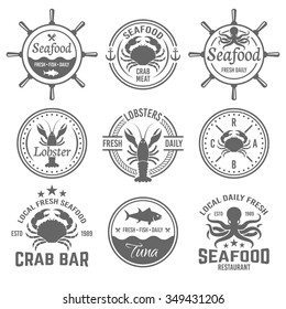 Seafood set of monochrome vector labels, badges, emblems and logos isolated on white background, seafood restaurant menu design elements